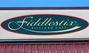 FIDDLESTIX WALL SIGN WITH PAN-FACES
